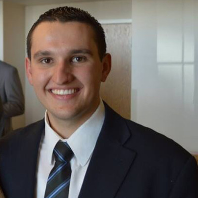 Jason Gilgen, VP of Operations at UtahPayee, professional portrait, warm and approachable expression, business casual attire